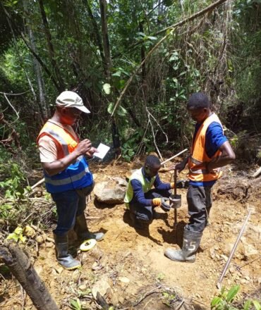 SELA technicians carrying out a dynamic cone penetrometer (DCP) test along the Gehwee Junction – Gbedin Falls road alignment, Nimba County