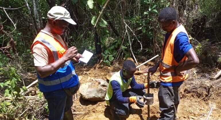 SELA technicians carrying out a dynamic cone penetrometer (DCP) test along the Gehwee Junction – Gbedin Falls road alignment, Nimba County