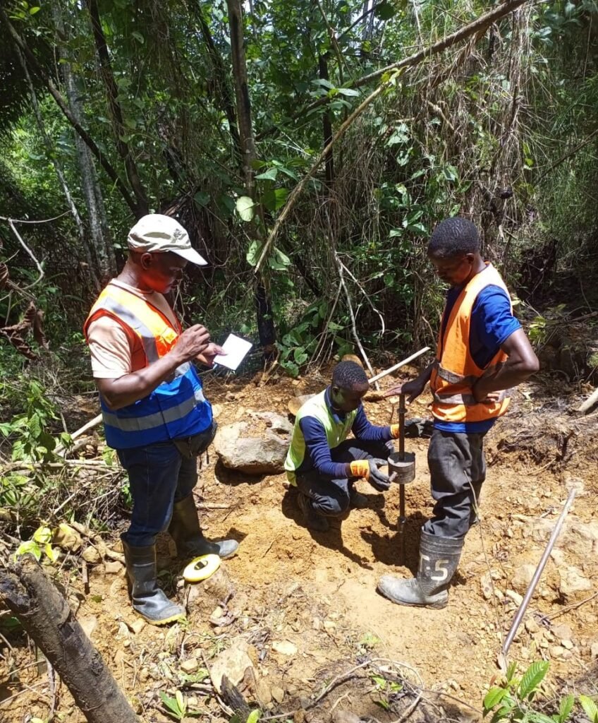 SELA technicians carrying out a dynamic cone penetrometer (DCP) test along the Gehwee Junction – Gbedin Falls road alignment, Nimba County