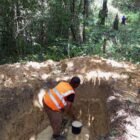 Trial pit excavation and dewatering before soil sampling on the Gehwee Junction – Gbedin Falls access road, Nimba County, Liberia